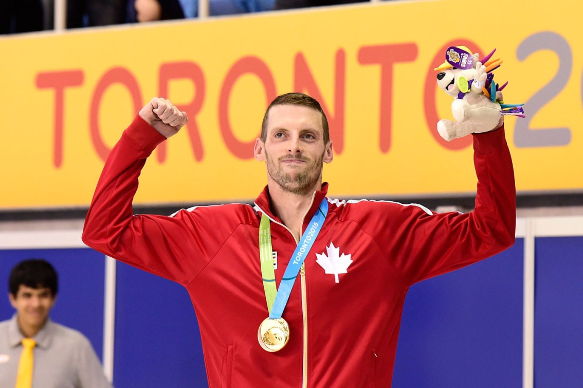 Ryan Cochrane won his 3rd medal of Toronto 2015, swimming to gold in the men's 1500m. (Photo: Canadian Press)
