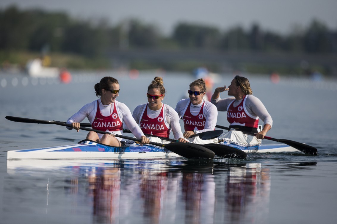 KC Fraser, Emilie Fournel Michelle Russell, Hannah Vaughan in the water