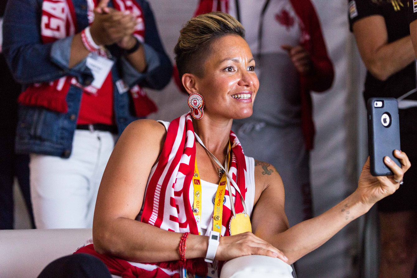 Horn-miller is enthralled by one of the nightly events at Canada House.
