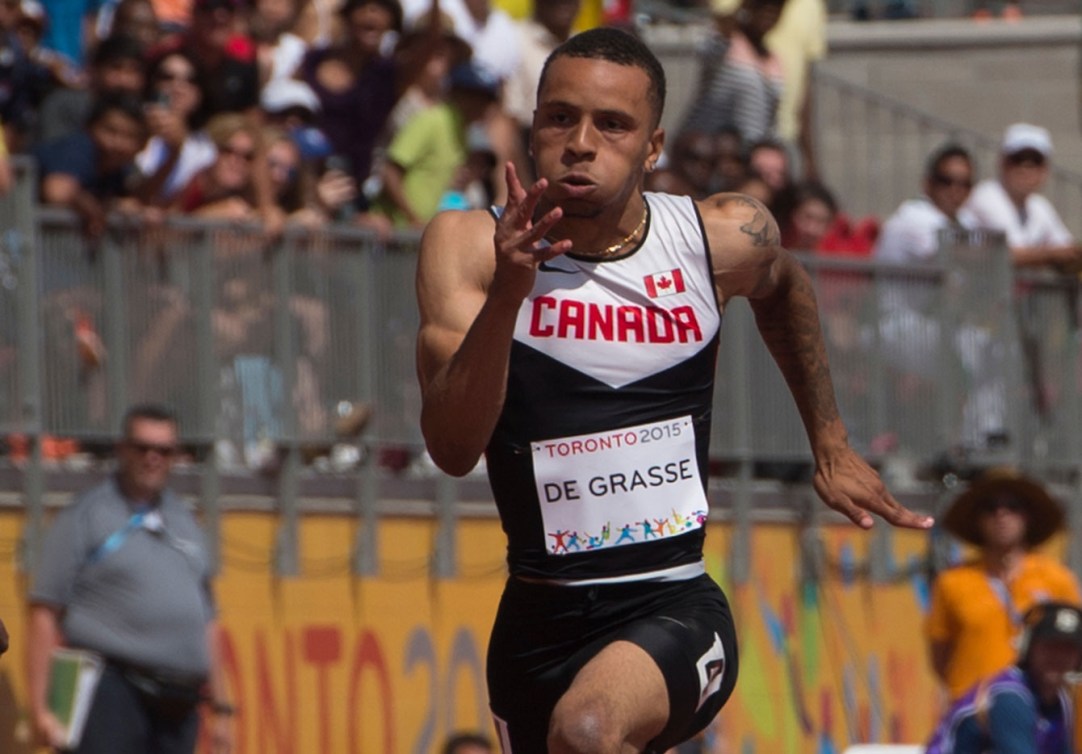 Andre De Grasse took gold in the men's 100m on Day 13 of Toronto 2015.