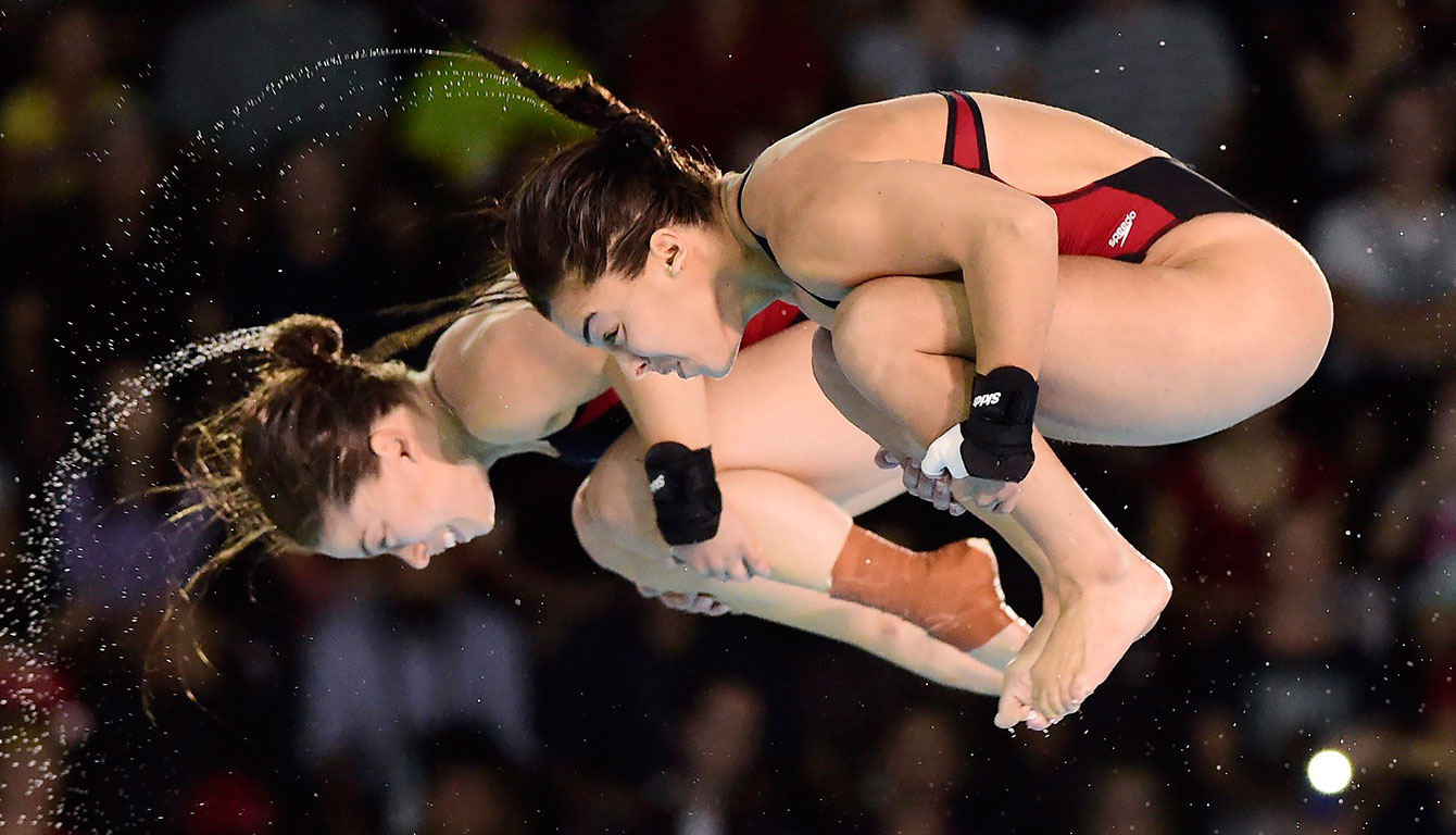 Roseline Filion (left) and Meaghan Benfeito (right) during the synchro 10m platform final at the Toronto 2015 Pan American Games.