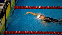 Canada's Hilary Caldwell reaches for the wall to win the women's 200m backstroke.