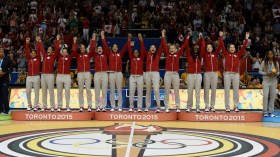 Team Canada's women's basketball team celebrates winning gold