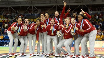 Team Canada's women's basketball team celebrates winning gold