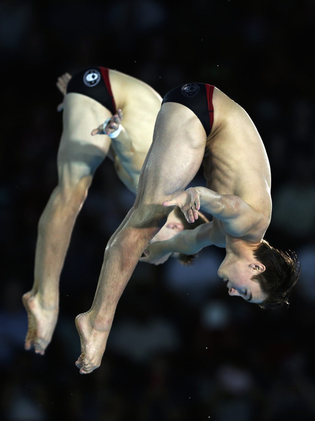 Philippe Gagne and Vincent Riendeau of Canada compete in the Men's 10m Synchro Final. Photo by Vaughn Ridley. 