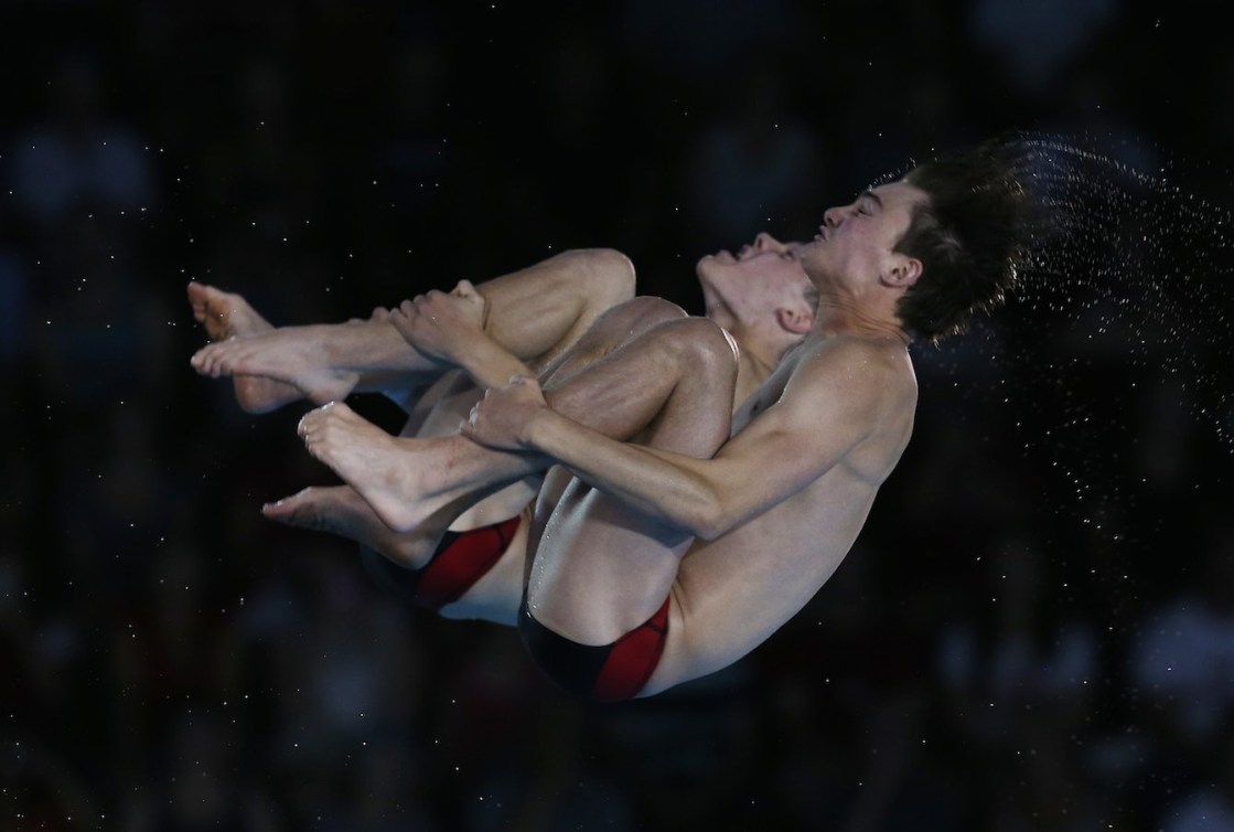 Philippe Gagne and Vincent Riendeau of Canada compete in the Men's 10m Synchro Final. Photo by Vaughn Ridley.
