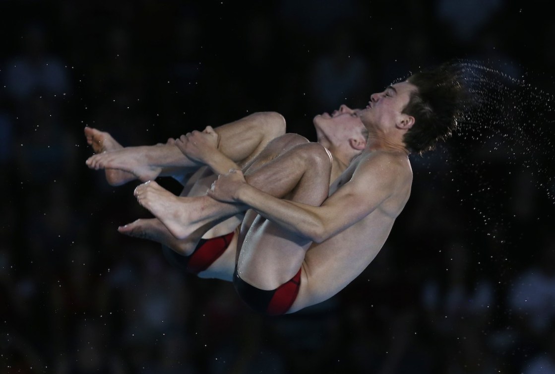 Philippe Gagne and Vincent Riendeau of Canada compete in the Men's 10m Synchro Final. Photo by Vaughn Ridley. 