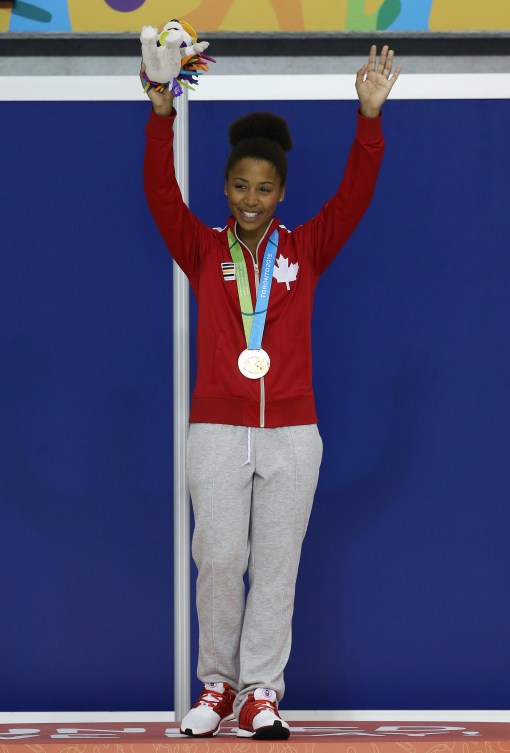 TORONTO, ON - JULY 12: Jennifer Abel of Canada wins Gold in the Women's 3m Springboard Final during the Toronto 2015 Pan Am Games at the CIBC Aquatic Centre on July 12, 2015 in Toronto, Ontario, Canada. (Photo by Vaughn Ridley/Canada Diving)