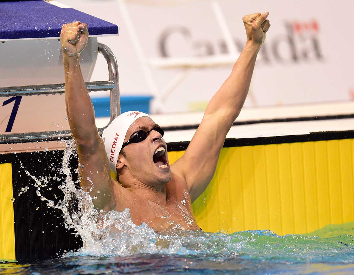 Local swimmer Zack Chetrat reacts after winning 200m butterfly bronze at the Toronto 2015 Pan American Games.