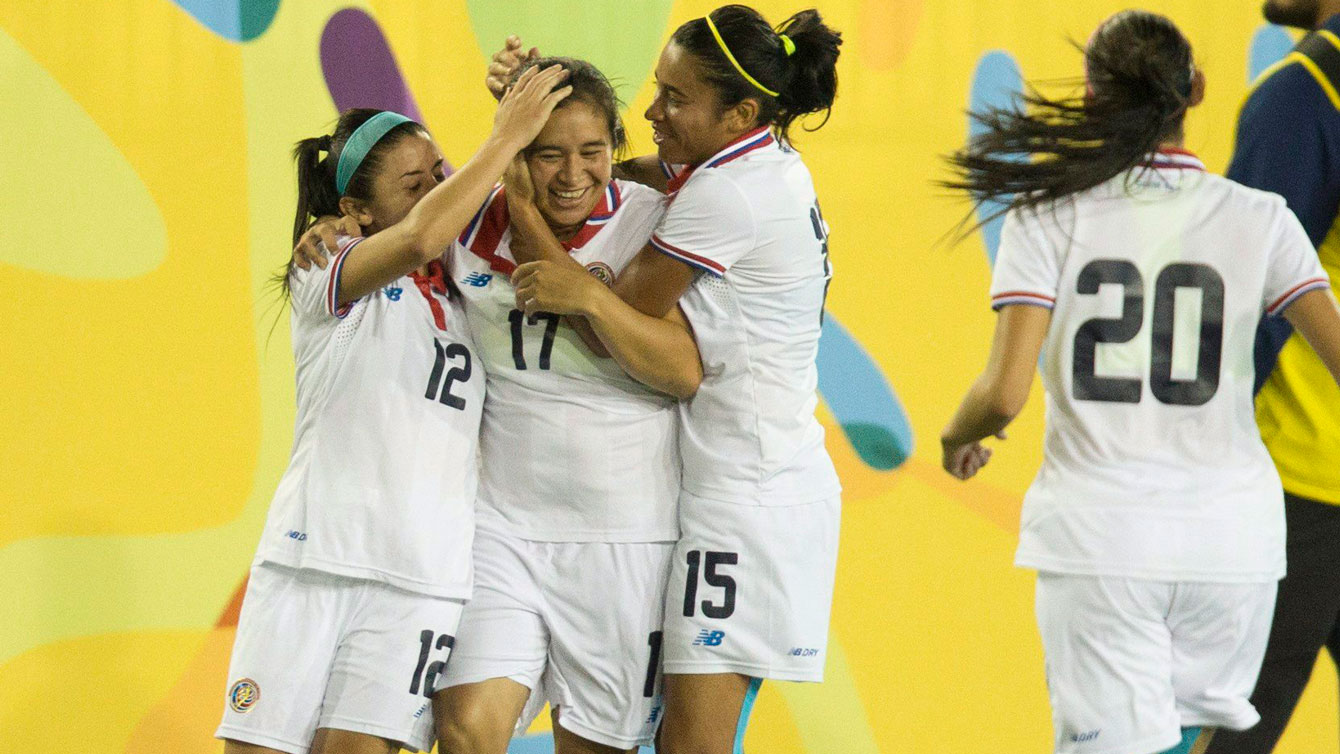 Costa Rica players celebrate a goal against Canada in women's Pan Am Games football on July 15, 2015.