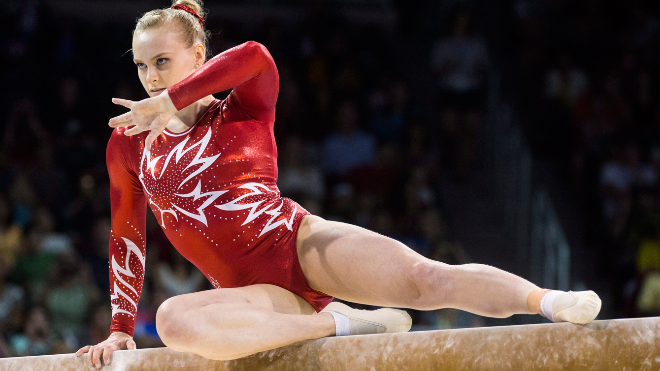 Ellie Black on her way to winning a gold medal in the artistic gymnastics balance beam at the Pan Am Games on July 15, 2015. (THE CANADIAN PRESS/Mark Blinch)