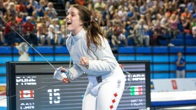 Gabriella Page celebrates a win in Women's Sabre competition