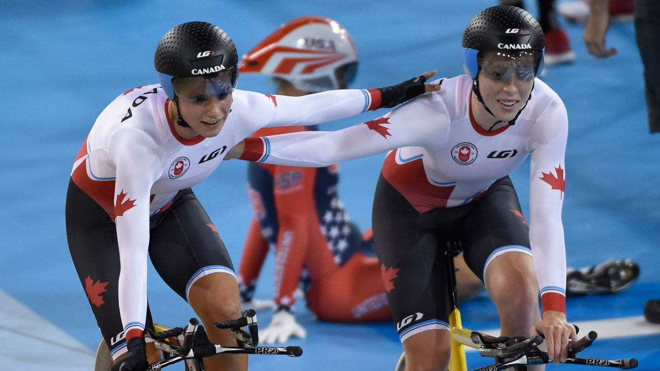 Jasmin Glaesser and Allison Beveridge following their women's team pursuit Pan Am Games victory on July 17, 2015.