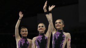 Team Canada competes in the Group Hoops + Clubs competition