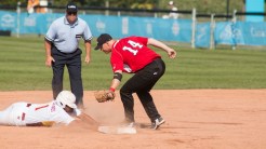 Shortstop Ian Fehrman tags a venezuelan player out