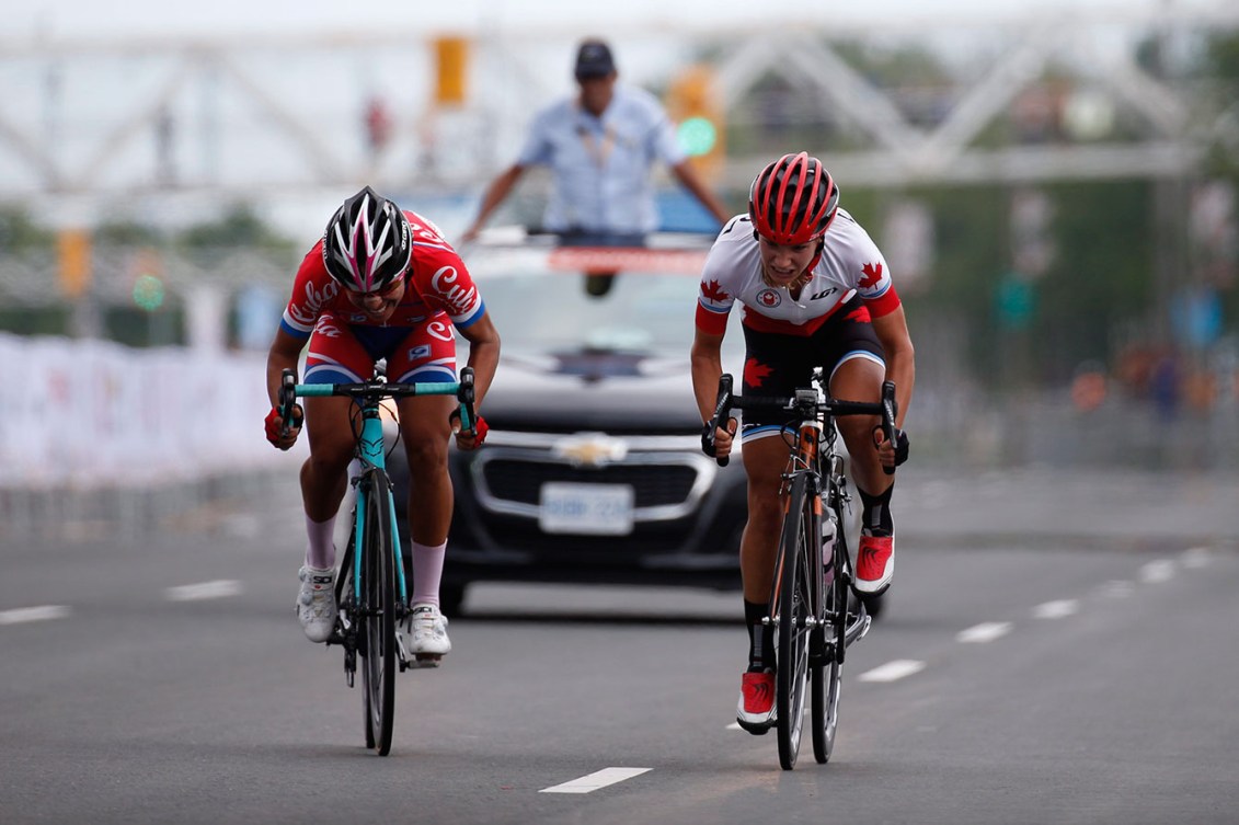 Jasmin Glaesser (right) and Cuba's Marlies Majias sprint to the finish of the women's road race. Glaesser won.