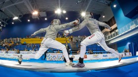 Joseph Polossifakis faces off against an opponent from the Virgin Islands