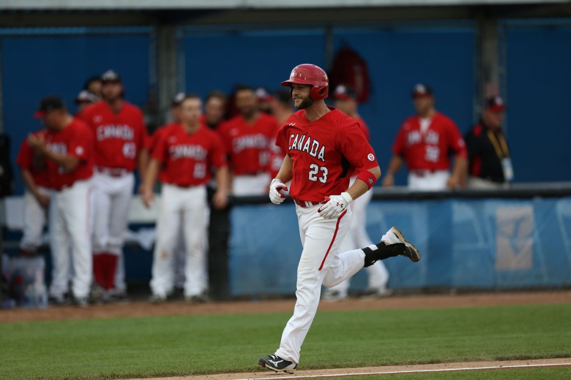 Rene Tosoni hit a three-run home run to keep Canada in the gold medal game. (Photo: Greg Kolz)