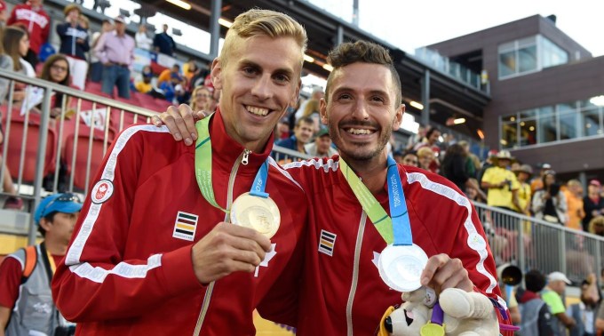 Matt Hughes and Alex Genest Matt Hughes and Alex Genest pose with their medals