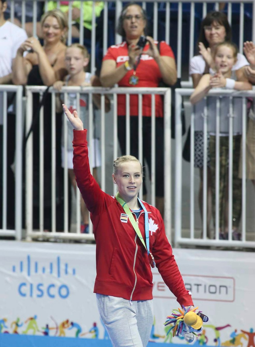 Ellie Black of Halifax waves to the crowd