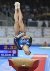 Ellie Black of Halifax, Nova Scotia jumps to the bronze medal in vault in artistic gymnastics competition at the PanAmerican Games in Toronto, Tuesday, July 14, 2015 (Photo by Mike Ridewood/COC).
