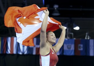 Braxton Stone-Papadopoulos of Pickering, Ontario celebrates her gold medal victory in the freestyle wrestling finals of the Pan American Games in Mississauga, Ontario, Friday, July 17, 2015 (Photo by Mike Ridewood/COC).