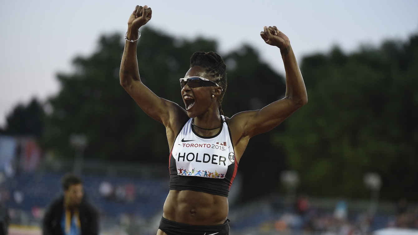 Nikkita Holder celebrates bronze in the women's 100m hurdles event at the Pan American Games in Toronto, July 21, 2015.