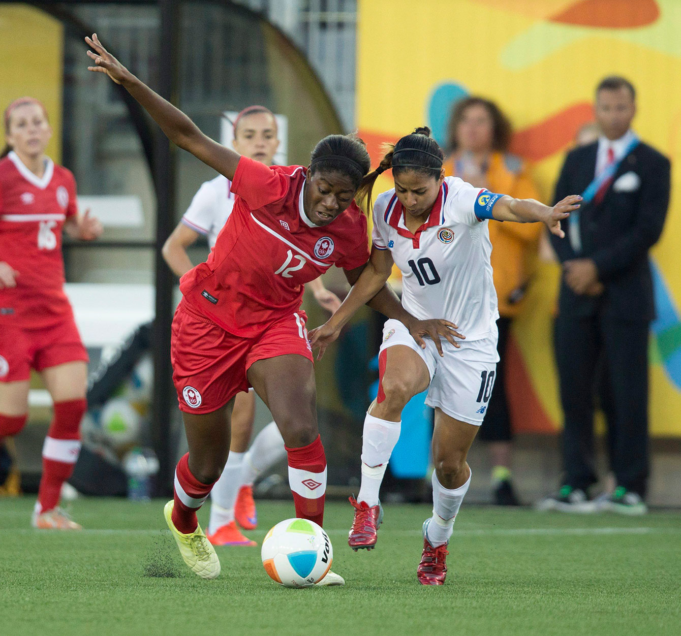 Canada's Nkemjika Ezurike (12) and Costa Rica's Shirley Cruz (10) at Pan Am Games soccer action on Wednesday, July 15, 2015.