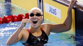 Overholt post racing smiling
