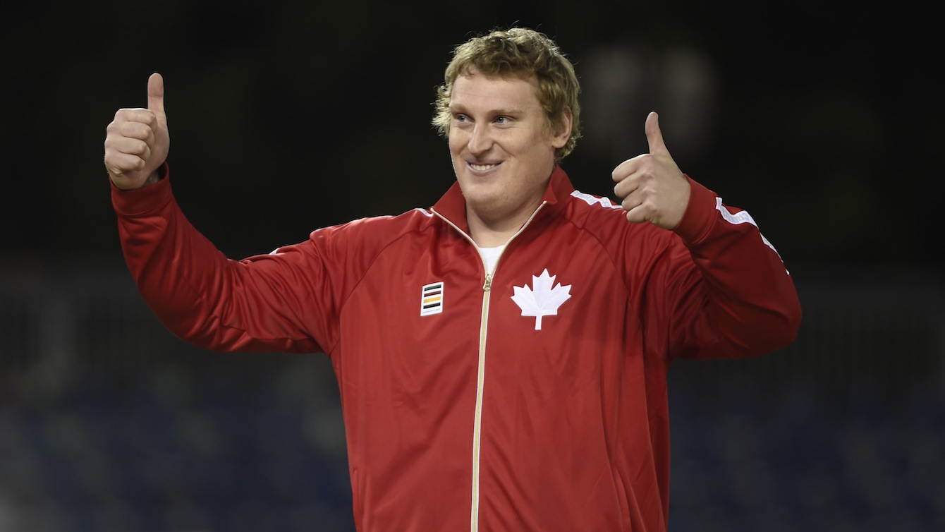 Tim Nedow celebrates silver in the men's shot put