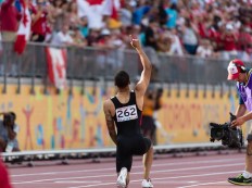 Andre De Grasse at TO2015 after winning the 200m (COC Photo by Winston Chow).