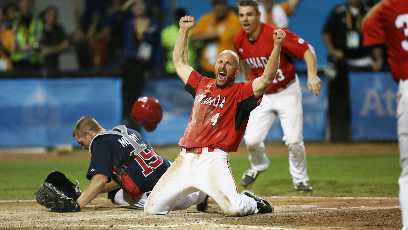 Peter Orr celebrates the gold medal-winning run in Pan Am Games men's baseball at Toronto 2015.