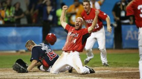 Peter Orr celebrates the gold medal-winning run in Pan Am Games men's baseball at Toronto 2015.