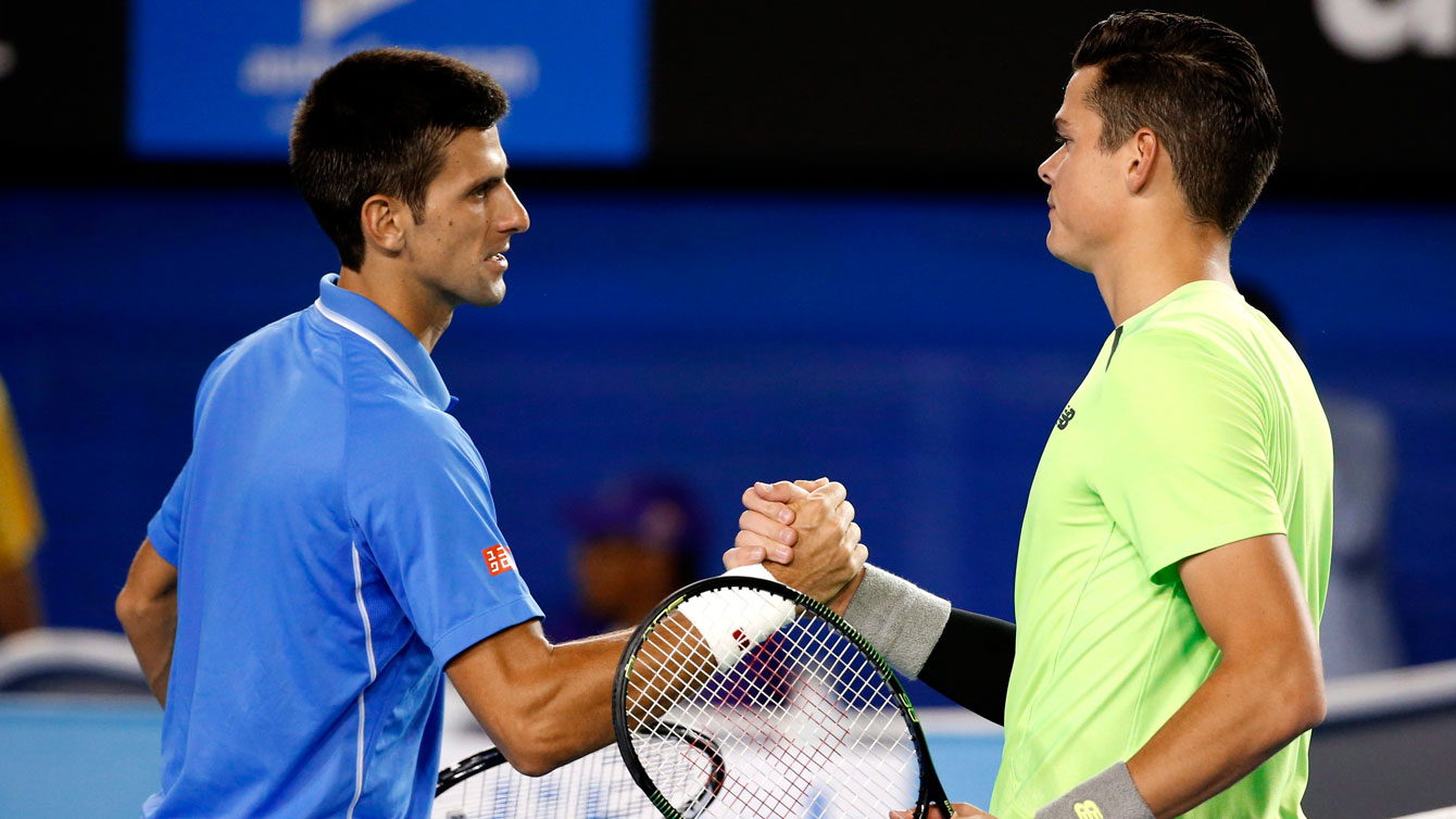 World's top tennis player Novak Djokovic is congratulated by Canada's Milos Raonic (right) after the Serbian won their quarterfinal match at the Australian Open on January 28, 2015.
