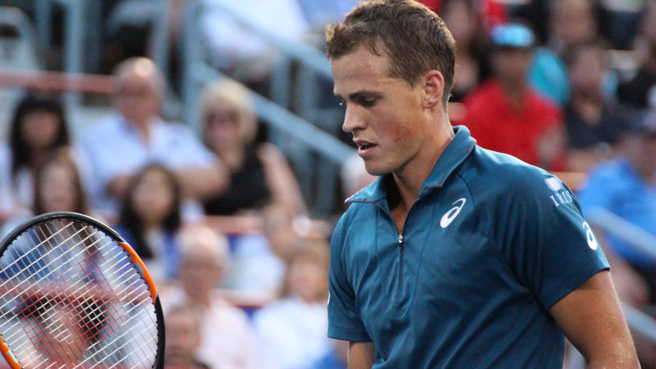 Vasek Pospisil at the Rogers Cup against John Isner in the second round on August 12, 2015. 