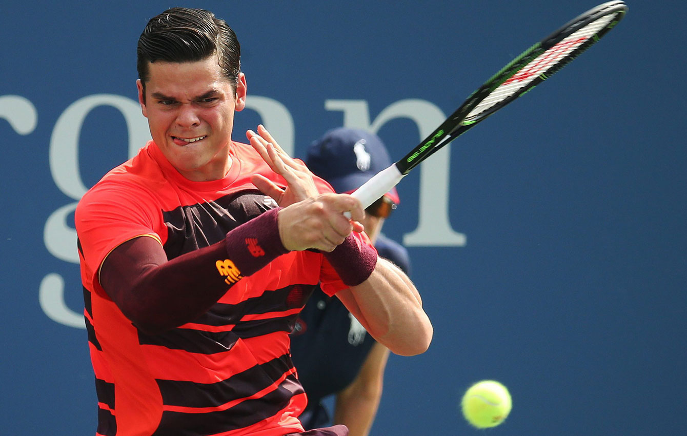 Milos Raonic strikes a forehand against Tim Smyczek of the United States at US Open first round on August 31, 2015.