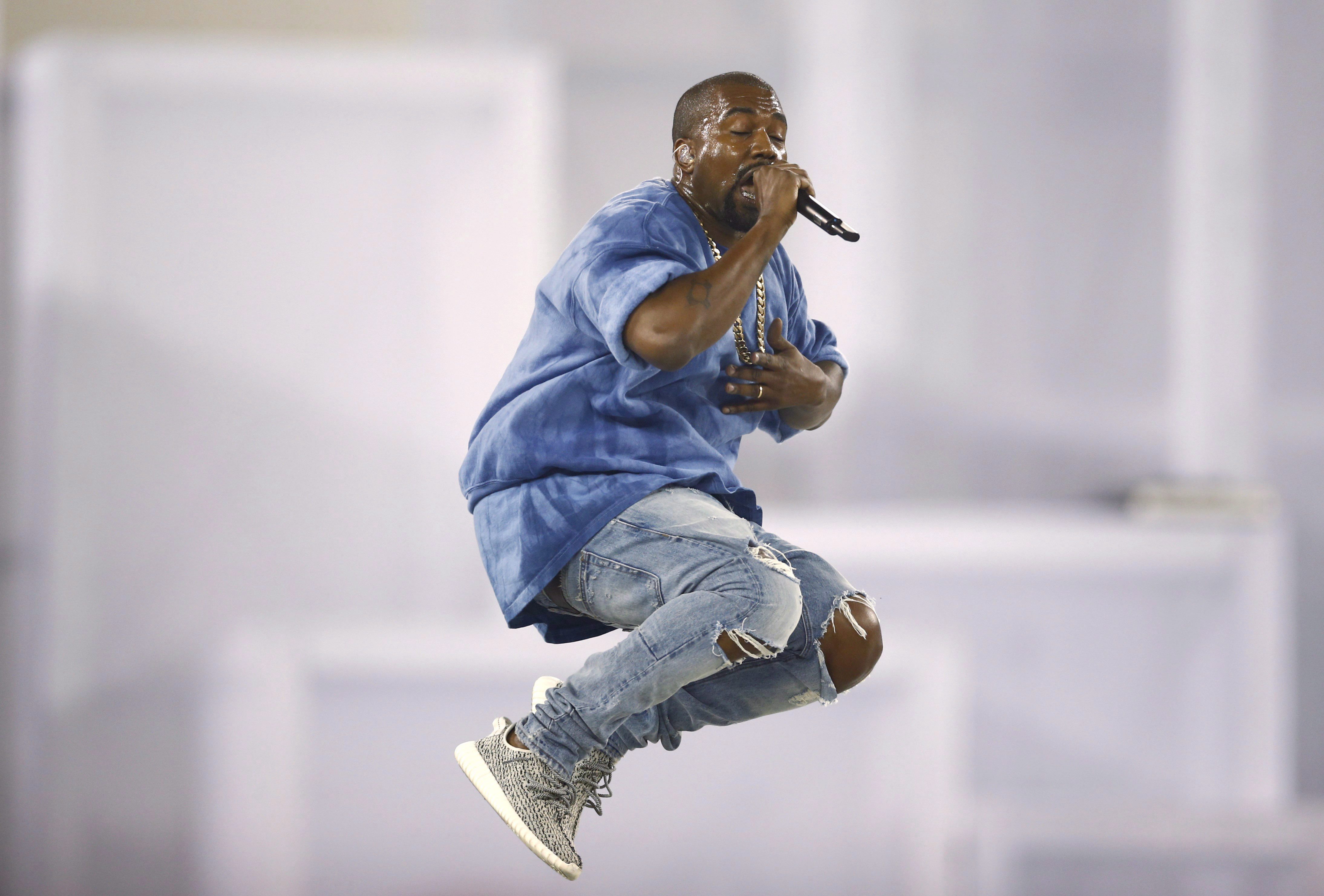 Kanye West performs during the closing ceremony of the 2015 Pan Am Games