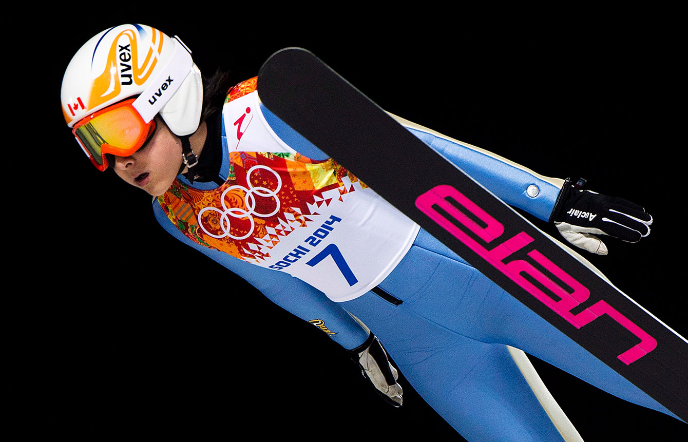 Canada's Atsuko Tanaka competes in the women's individual normal ski jumping event during the Sochi 2014 Olympic Winter Games in Krasnaya Polyana, Russia on Tuesday, February 11, 2014. THE CANADIAN PRESS/Nathan Denette