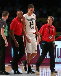 Dwight Powell left the game in the first half after a hard foul. (Photo: FIBA)
