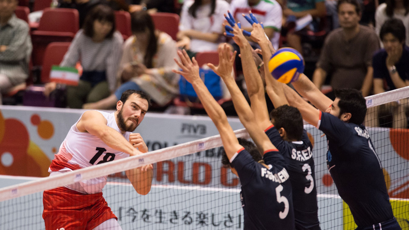 Nicholas Hoag spikes through Iranian defence at the World Cup on September 22, 2015 (Photo: FIVB). 
