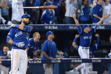 09743137 The infamous "Joey Bat-flip" following Bautista's series-clinching homer.