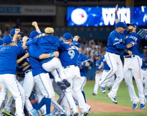 09743283 The team celebrates its first playoff series win in 22 years.