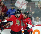 Ottawa Senators' Nick Paul (13)celebrates his goal with teammate Chris Neil (25) during second period NHL pre-season hockey against the Bufallo Sabres in Ottawa Saturday September 26, 2015.