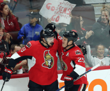 Senators Ottawa Senators' Nick Paul (13)celebrates his goal with teammate Chris Neil (25) during second period NHL pre-season hockey against the Bufallo Sabres in Ottawa Saturday September 26, 2015.