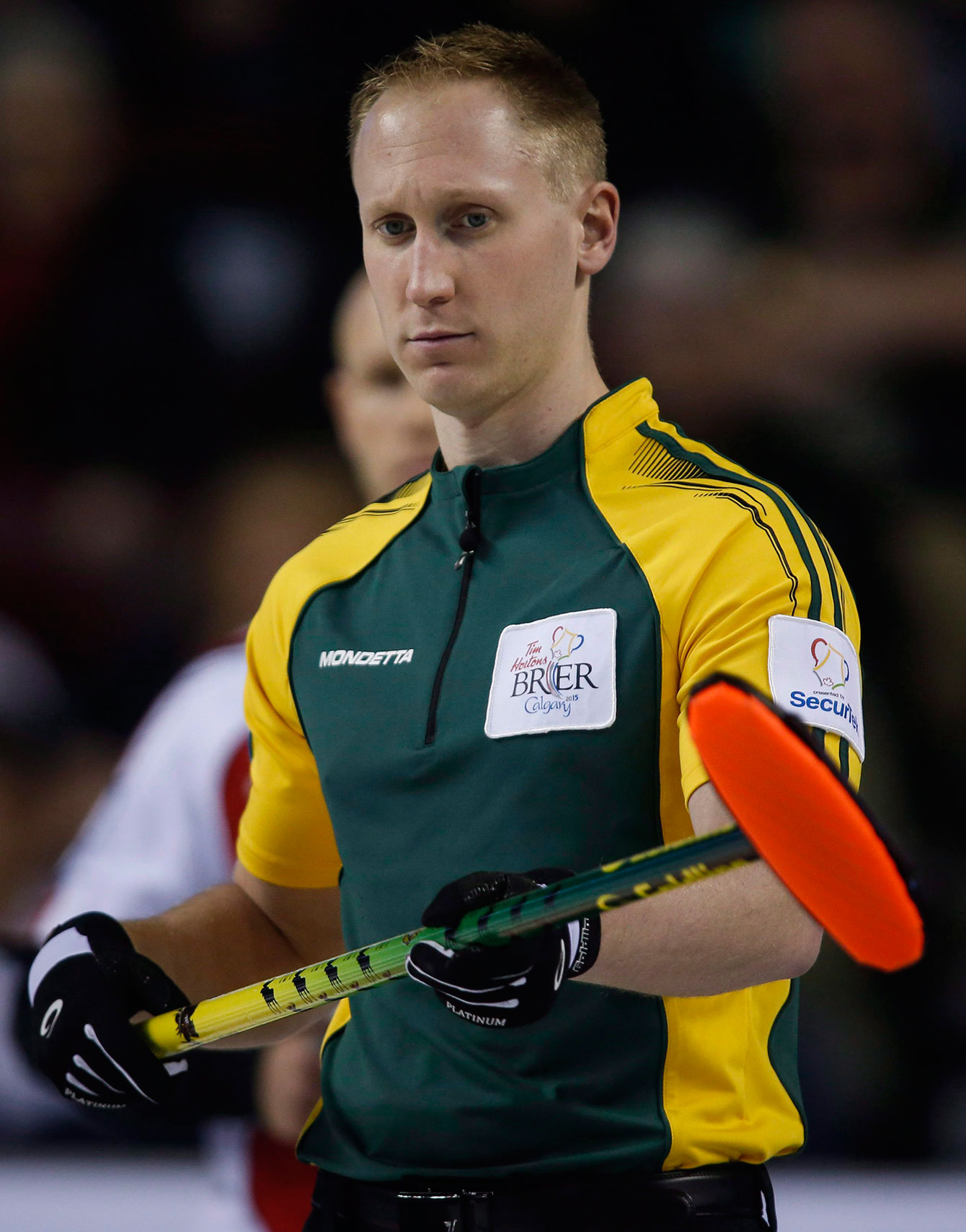 Brad Jacobs, toting a regular broom at the 2015 Brier.