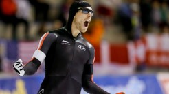 William Dutton celebrates his silver medal in the weekend's second 500m World Cup race in Calgary on November 15, 2015.