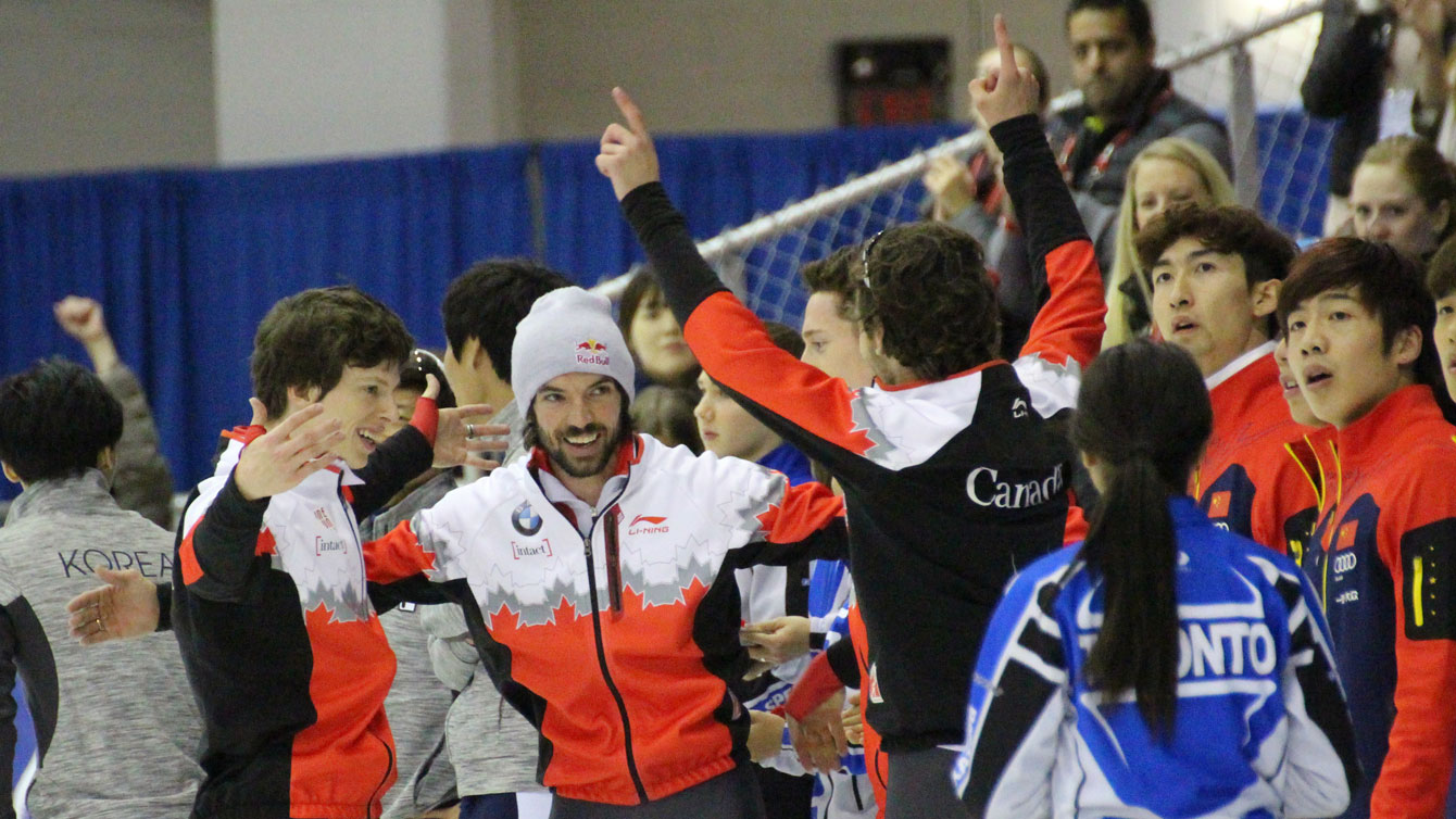 Team Canada skaters celebrate after official results flash relay gold in the ISU short track World Cup in Toronto on November 8, 2015. 