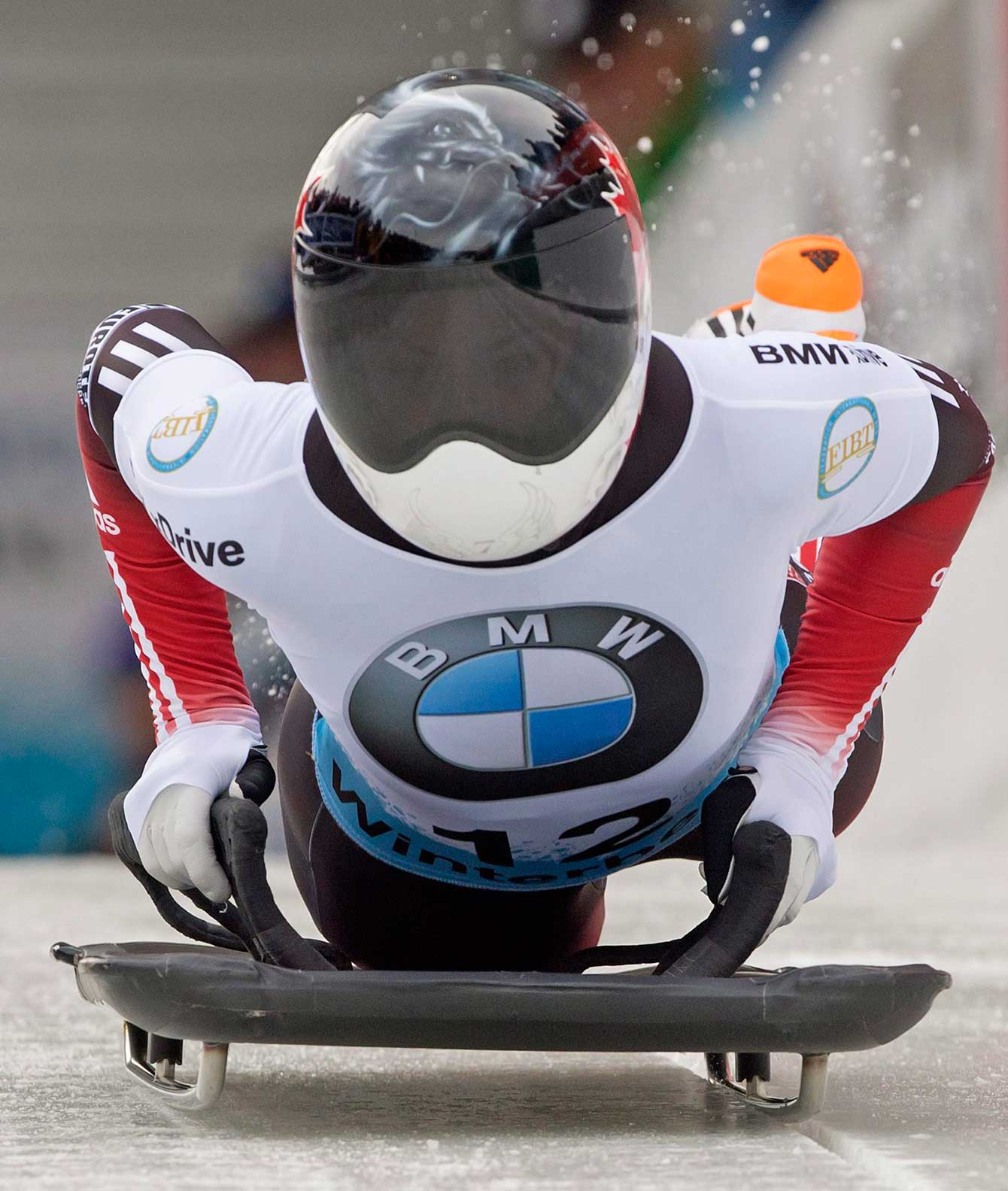 Jane Channell of Canada starts during her third run in the women's skeleton race at the Bob and Skeleton World Championships in Winterberg, Germany, Saturday, March 7, 2015. (AP Photo/Jens Meyer)