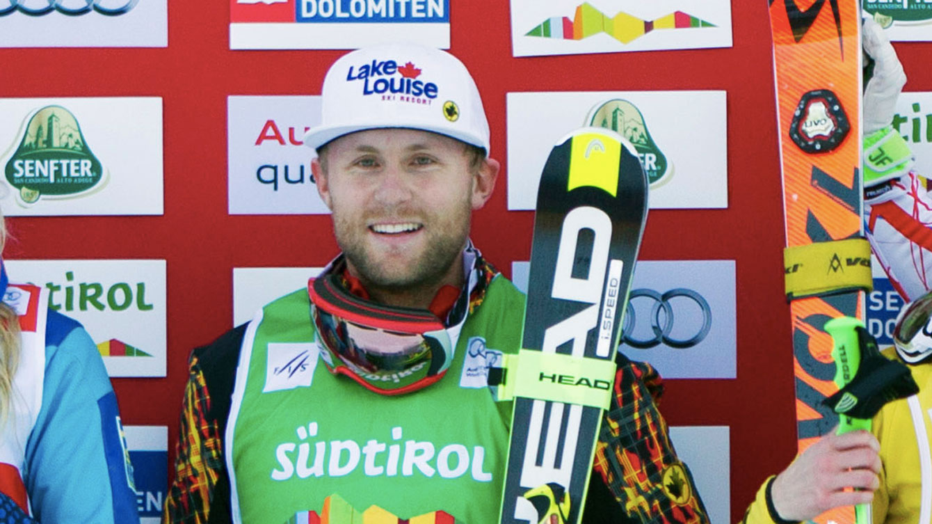 Brady Leman on the World Cup podium at Innichen, Italy on December 19, 2015 (Photo: GEPA Pictures for FIS).
