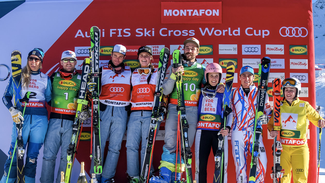 Starting second from left, Brady Leman, Chris Del Bosco and Marielle Thompson (in order) stand on the World Cup podium in Montafon, Austria on December 5, 2015 (Photo: GEPA Pictures for FIS).